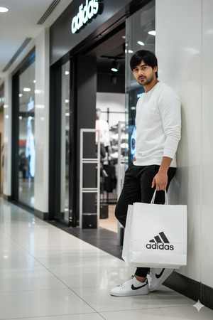 Leaning Near Store Entrance Premium Editorial Pose